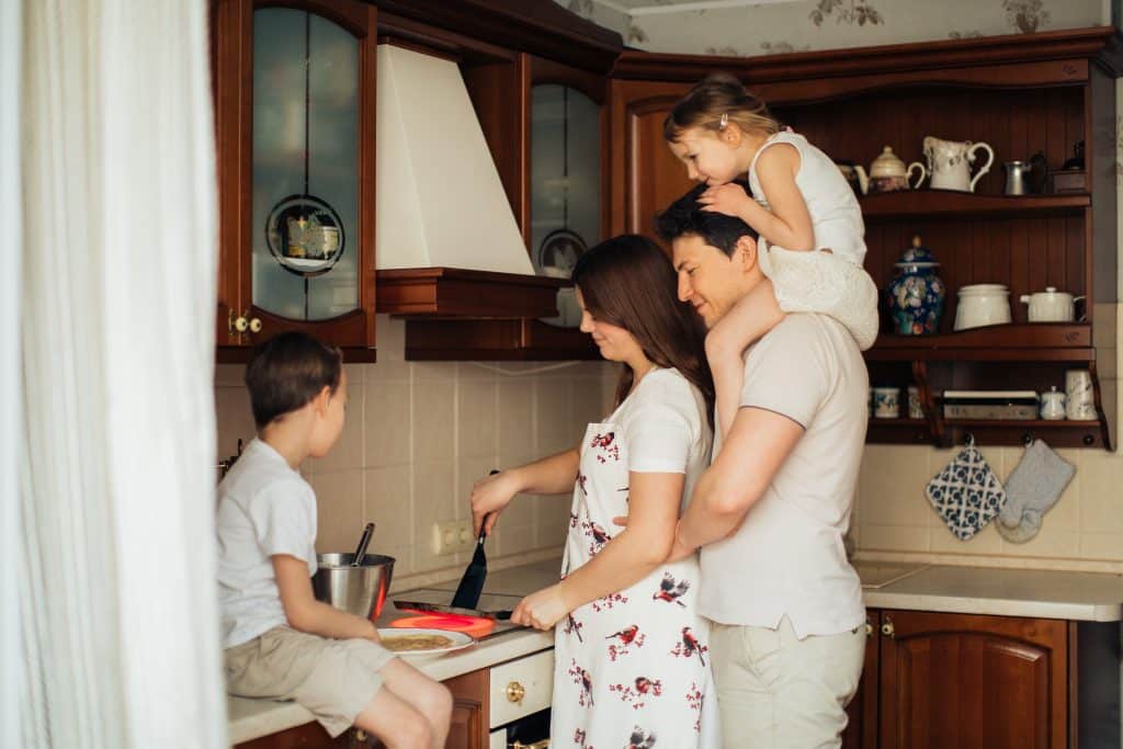 happy family cooking together